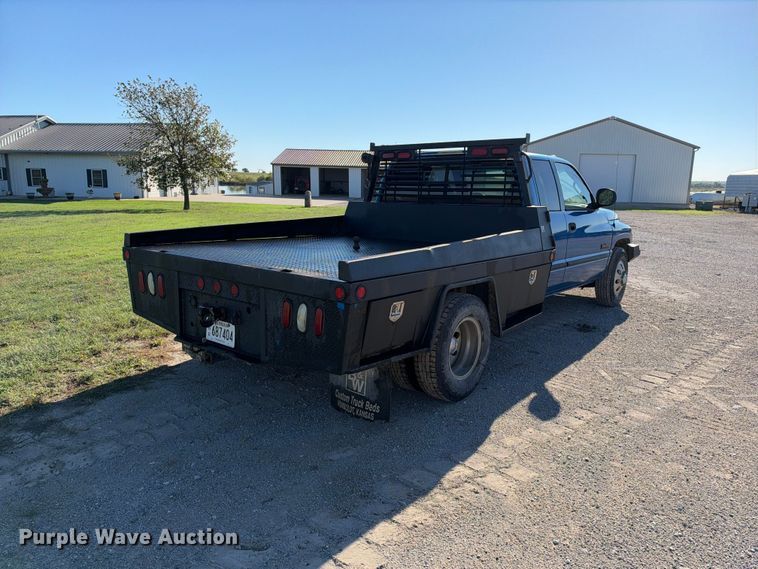 image for item EX2358 1999 Dodge Ram 3500 Ext. Cab flatbed pickup truck