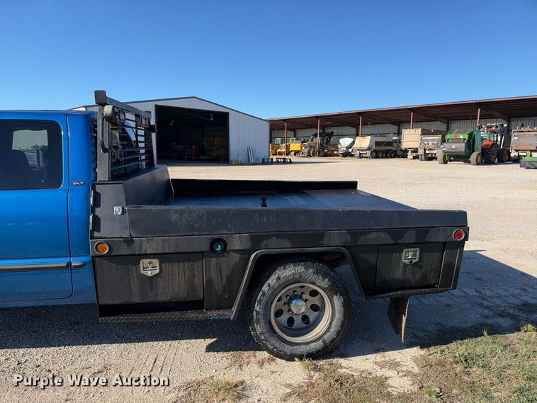 image for item EX2358 1999 Dodge Ram 3500 Ext. Cab flatbed pickup truck