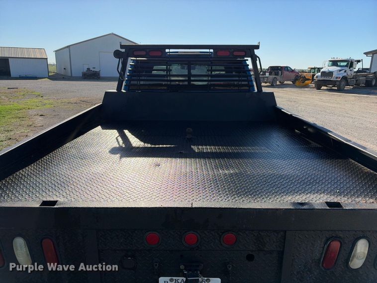 image for item EX2358 1999 Dodge Ram 3500 Ext. Cab flatbed pickup truck