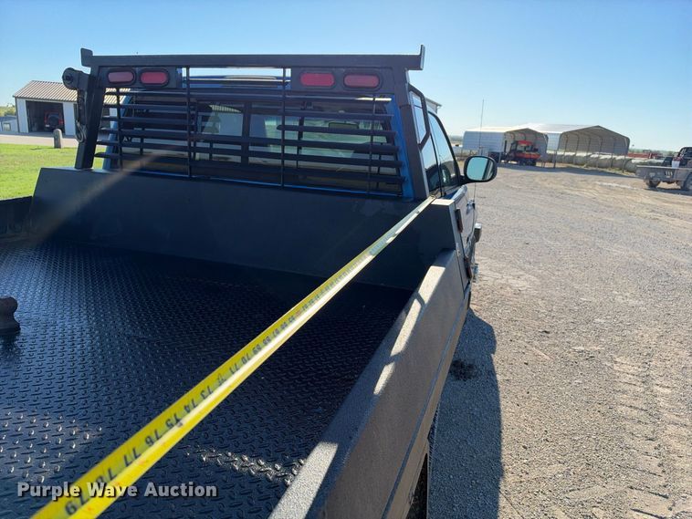 image for item EX2358 1999 Dodge Ram 3500 Ext. Cab flatbed pickup truck