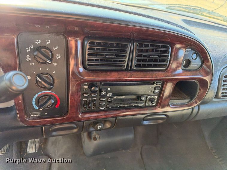 image for item EX2358 1999 Dodge Ram 3500 Ext. Cab flatbed pickup truck