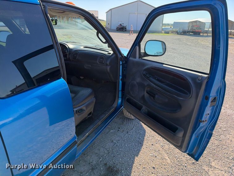 image for item EX2358 1999 Dodge Ram 3500 Ext. Cab flatbed pickup truck