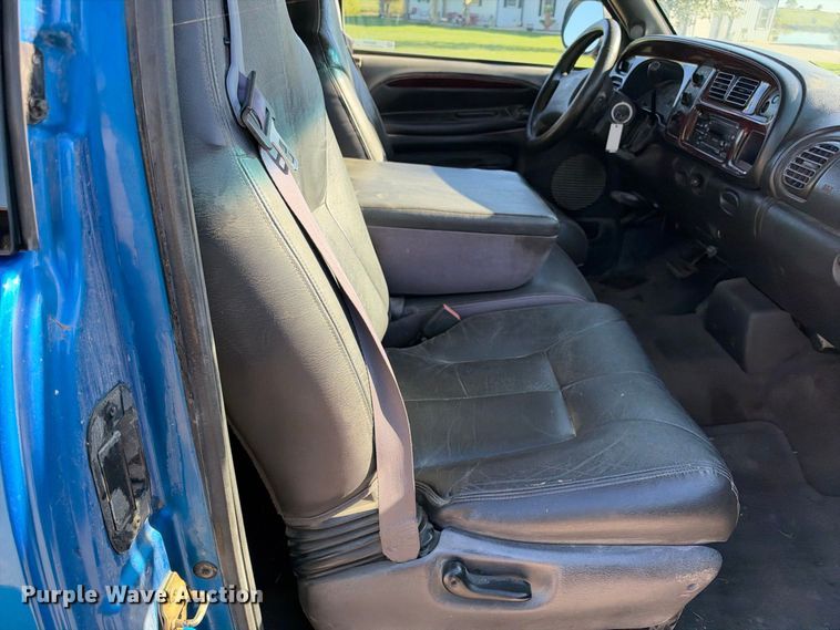image for item EX2358 1999 Dodge Ram 3500 Ext. Cab flatbed pickup truck