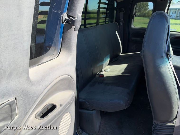 image for item EX2358 1999 Dodge Ram 3500 Ext. Cab flatbed pickup truck