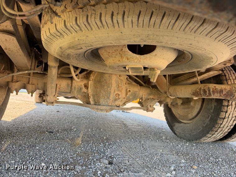 image for item EX2358 1999 Dodge Ram 3500 Ext. Cab flatbed pickup truck