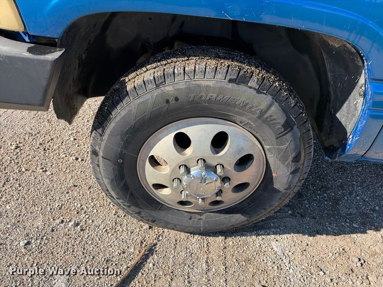 image for item EX2358 1999 Dodge Ram 3500 Ext. Cab flatbed pickup truck