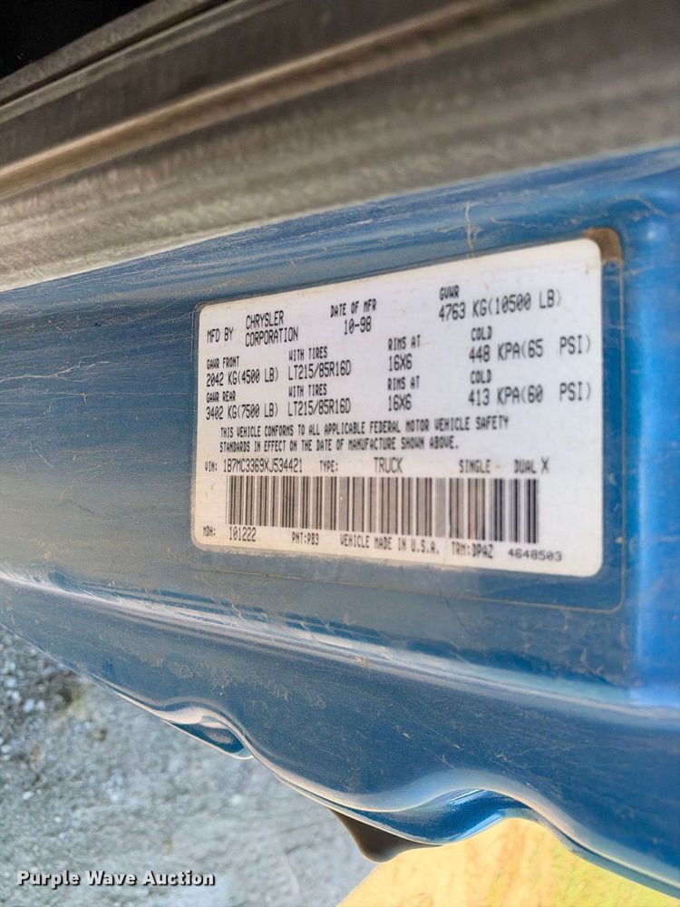 image for item EX2358 1999 Dodge Ram 3500 Ext. Cab flatbed pickup truck
