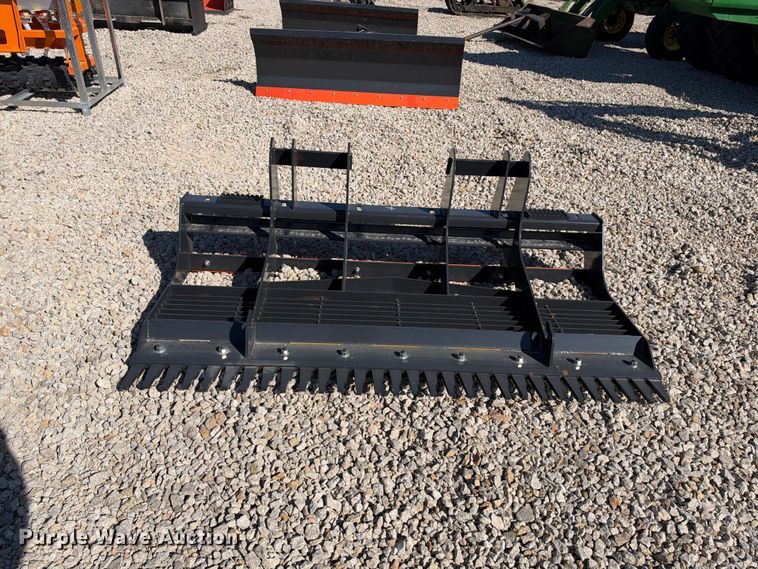 image for item EX2426 2026 Wolverine skid steer rake