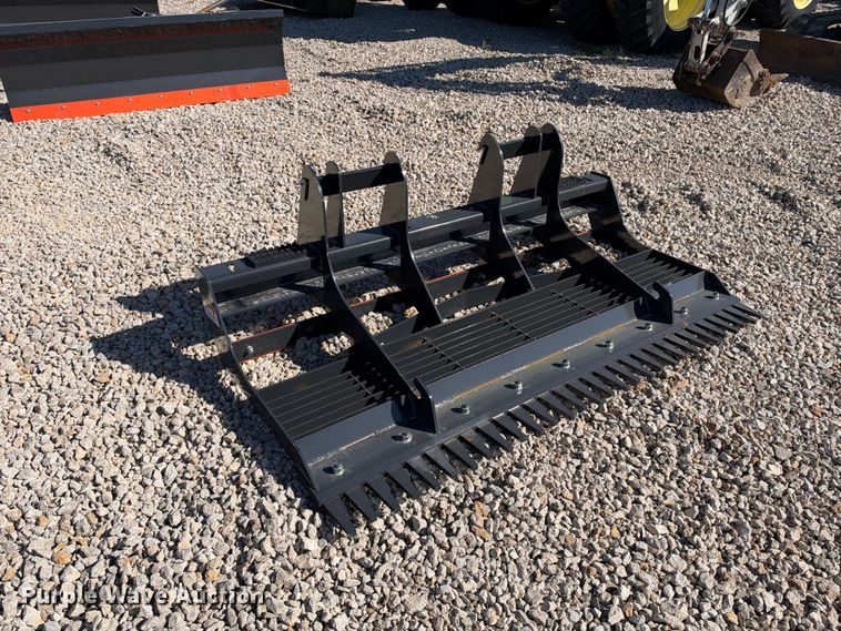 image for item EX2426 2026 Wolverine skid steer rake