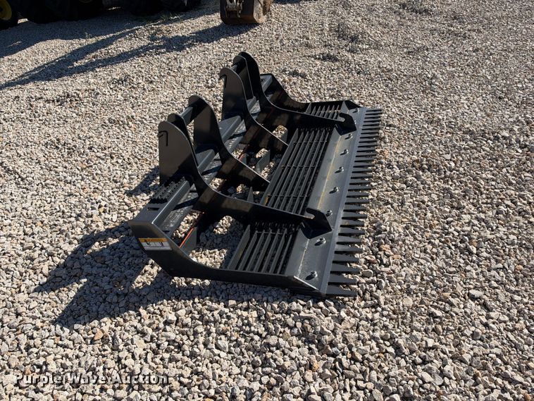 image for item EX2426 2026 Wolverine skid steer rake