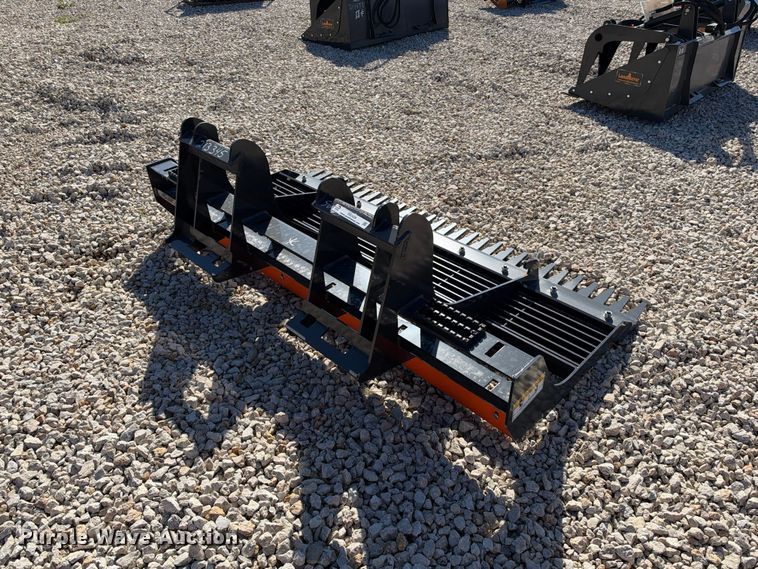 image for item EX2426 2026 Wolverine skid steer rake