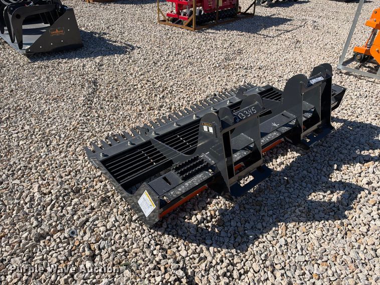 image for item EX2426 2026 Wolverine skid steer rake