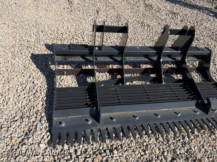image for item EX2426 2026 Wolverine skid steer rake