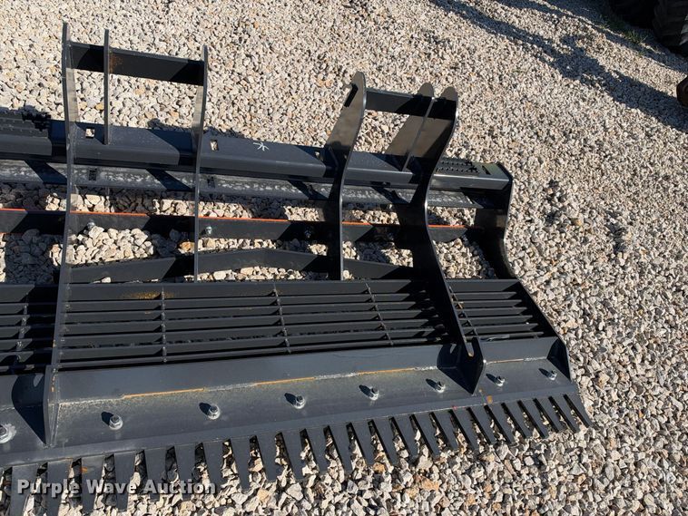 image for item EX2426 2026 Wolverine skid steer rake