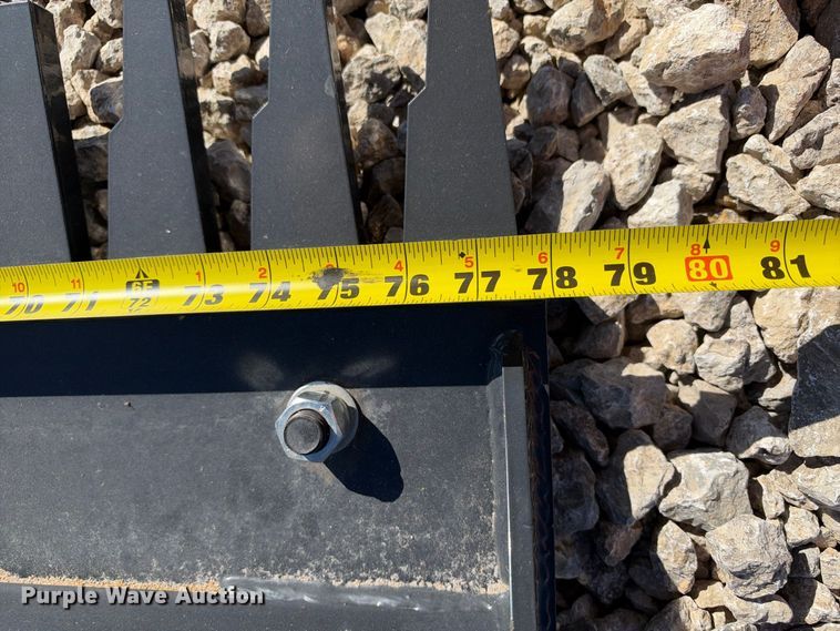 image for item EX2426 2026 Wolverine skid steer rake