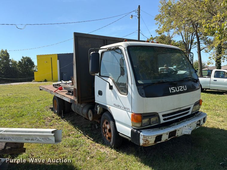 image for item FC3385 1999 Isuzu NPR flatbed truck