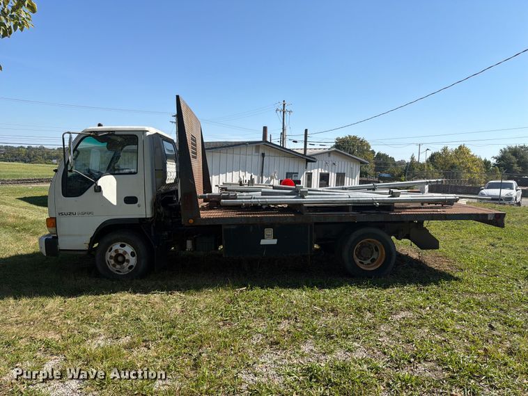 image for item FC3385 1999 Isuzu NPR flatbed truck