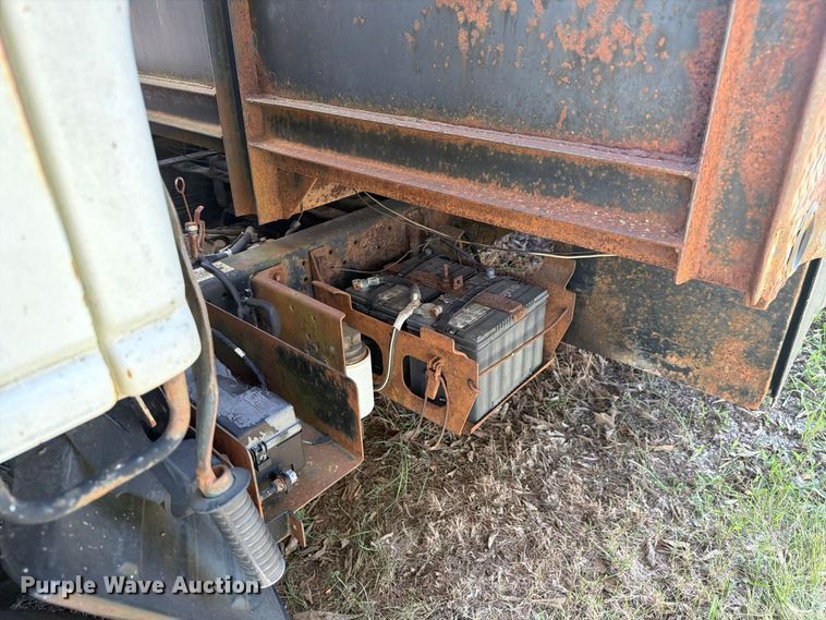 image for item FC3385 1999 Isuzu NPR flatbed truck