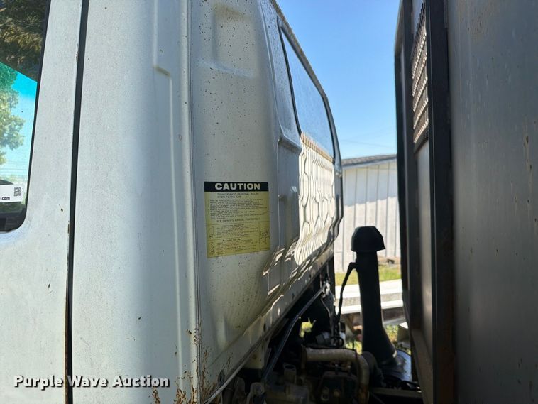 image for item FC3385 1999 Isuzu NPR flatbed truck