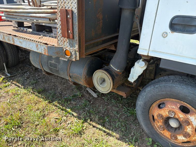 image for item FC3385 1999 Isuzu NPR flatbed truck