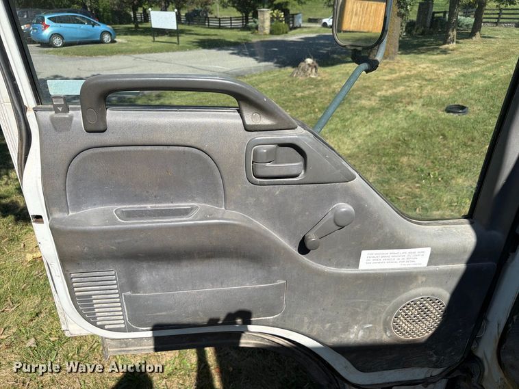 image for item FC3385 1999 Isuzu NPR flatbed truck