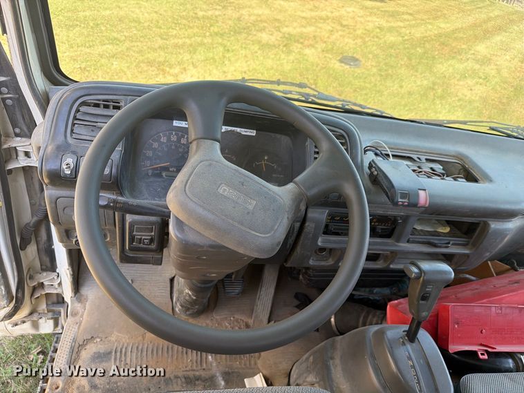 image for item FC3385 1999 Isuzu NPR flatbed truck