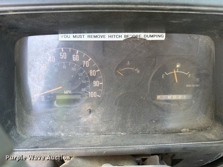 image for item FC3385 1999 Isuzu NPR flatbed truck