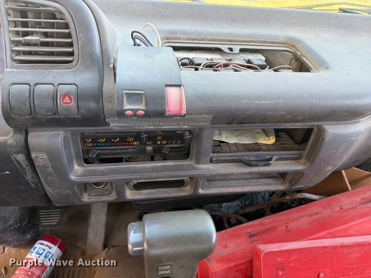 image for item FC3385 1999 Isuzu NPR flatbed truck