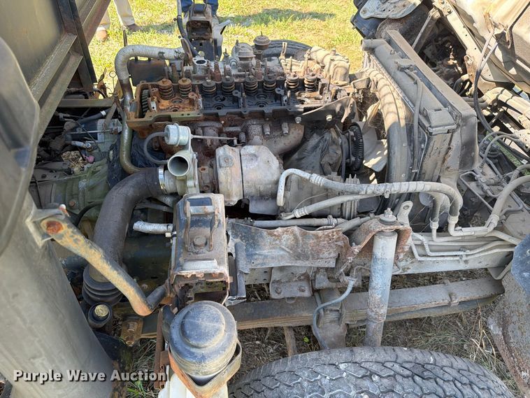 image for item FC3385 1999 Isuzu NPR flatbed truck