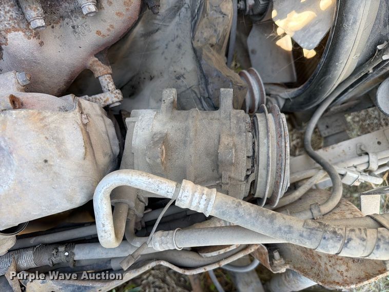 image for item FC3385 1999 Isuzu NPR flatbed truck
