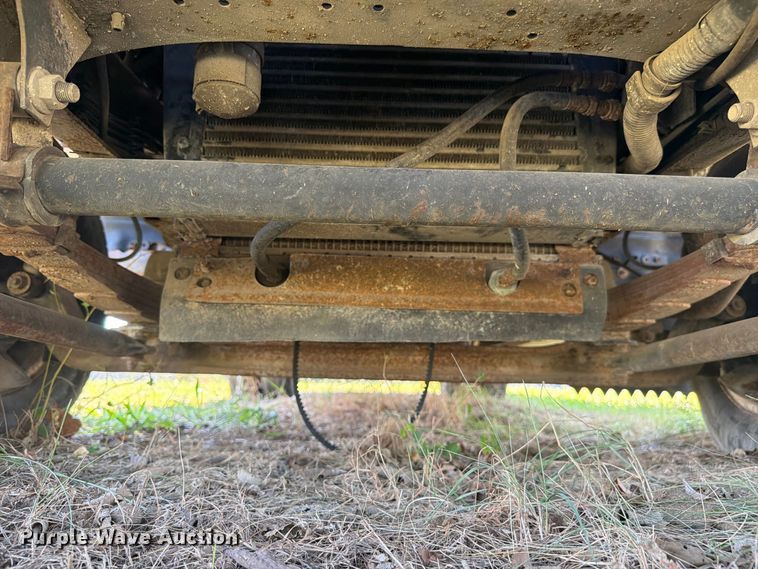 image for item FC3385 1999 Isuzu NPR flatbed truck