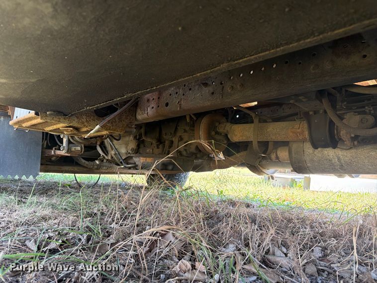 image for item FC3385 1999 Isuzu NPR flatbed truck