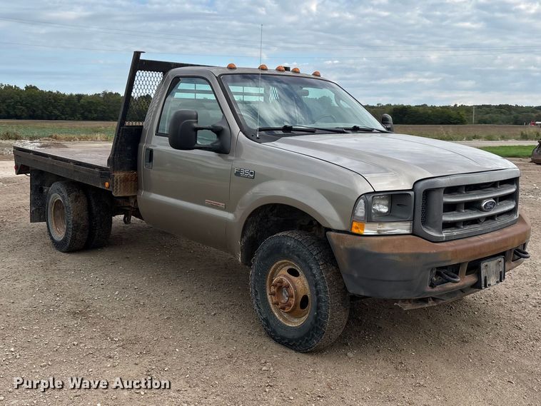image for item FG0726 2004 Ford F350 flatbed pickup truck