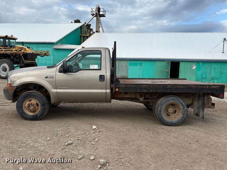 image for item FG0726 2004 Ford F350 flatbed pickup truck