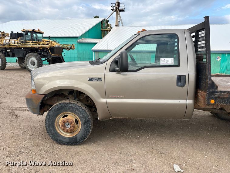 image for item FG0726 2004 Ford F350 flatbed pickup truck