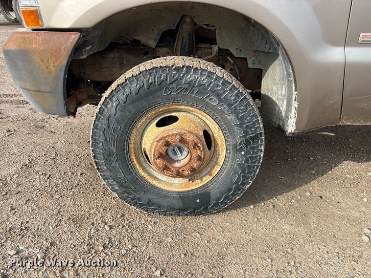 image for item FG0726 2004 Ford F350 flatbed pickup truck