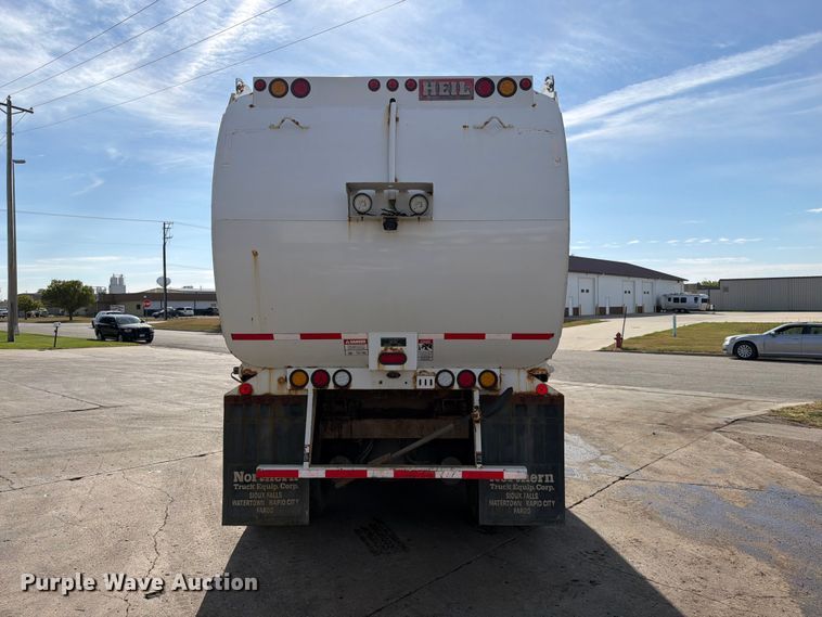 image for item FT6728 2015 Peterbilt 320 refuse truck
