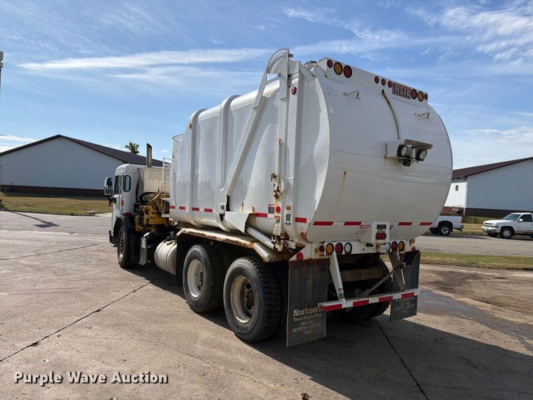 image for item FT6728 2015 Peterbilt 320 refuse truck