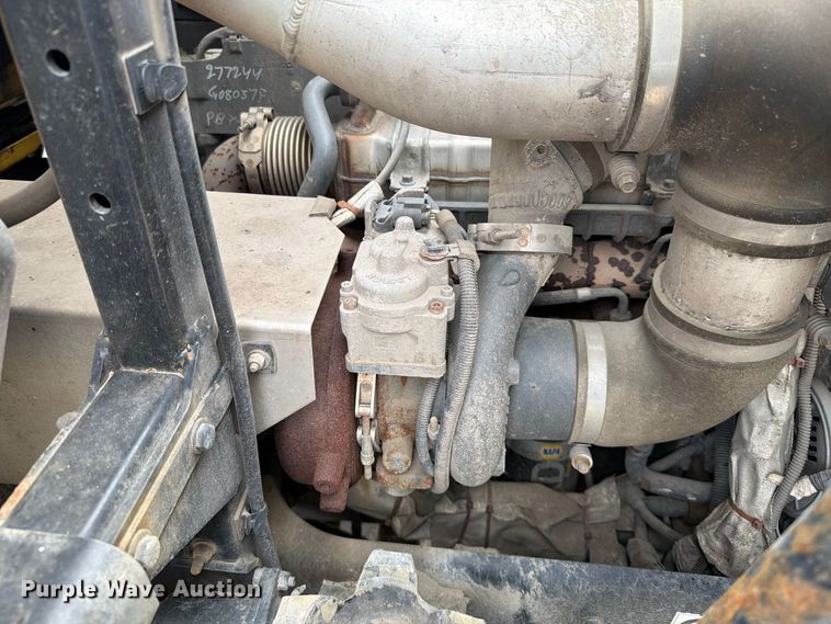 image for item FT6728 2015 Peterbilt 320 refuse truck