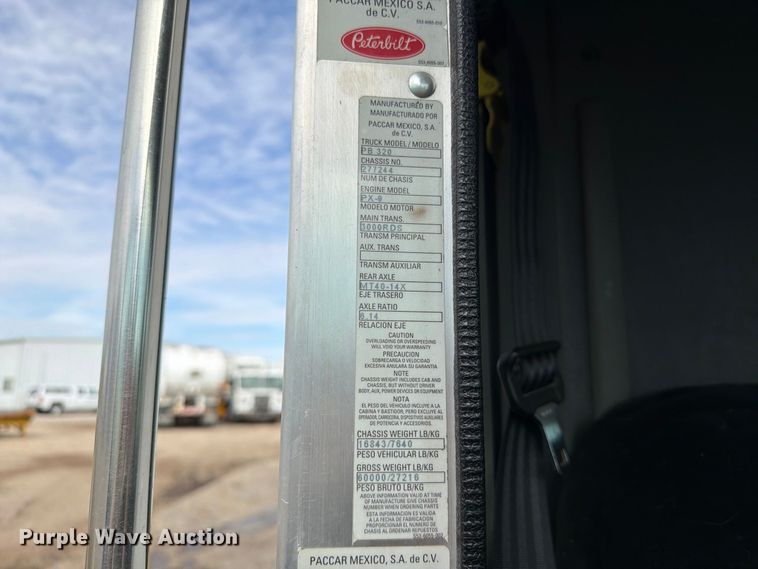 image for item FT6728 2015 Peterbilt 320 refuse truck