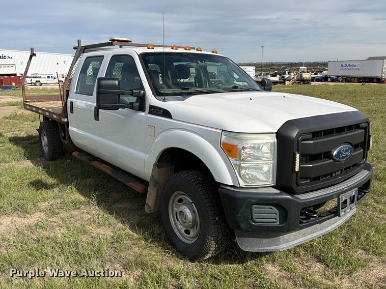 image for item FT6835 2012 Ford F350 Super Duty Crew Cab dump flatbed pickup truck