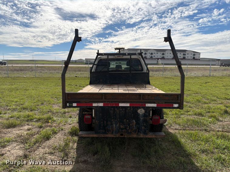 image for item FT6835 2012 Ford F350 Super Duty Crew Cab dump flatbed pickup truck