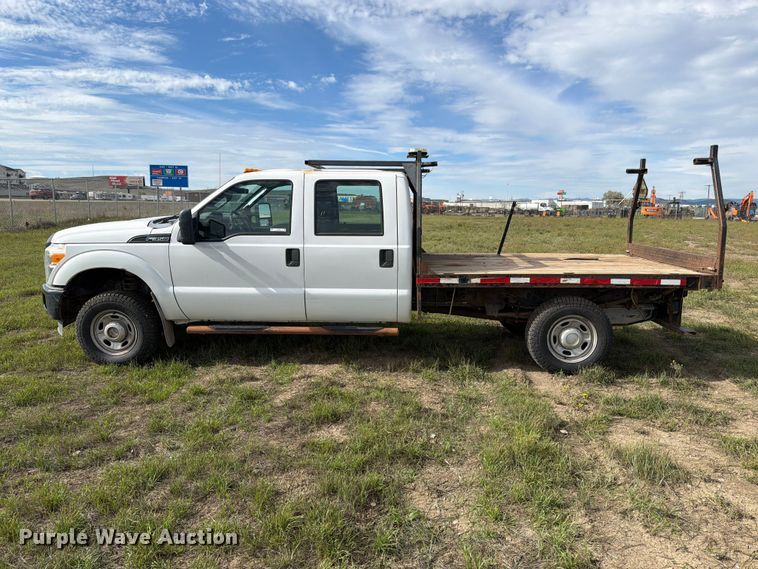 image for item FT6835 2012 Ford F350 Super Duty Crew Cab dump flatbed pickup truck