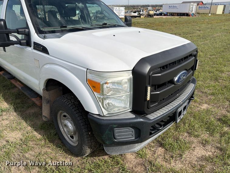 image for item FT6835 2012 Ford F350 Super Duty Crew Cab dump flatbed pickup truck