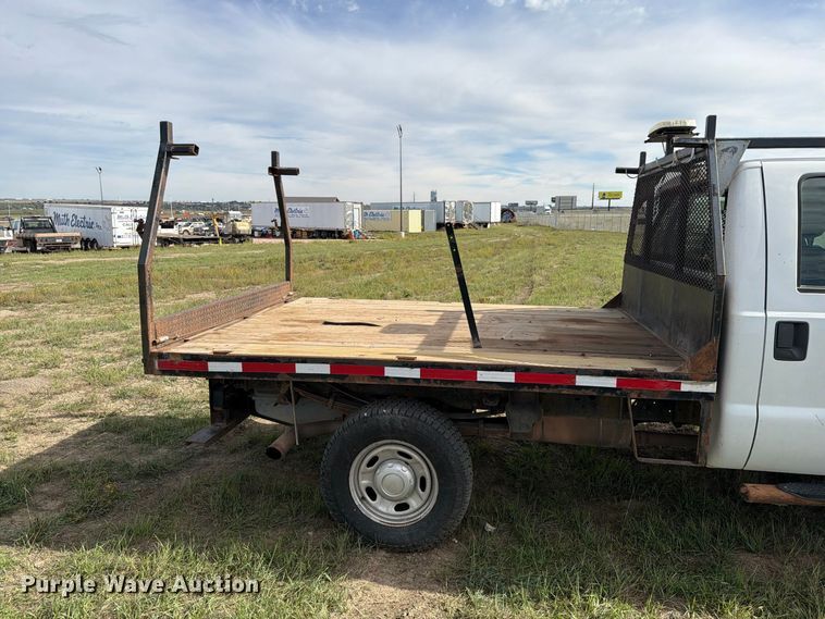 image for item FT6835 2012 Ford F350 Super Duty Crew Cab dump flatbed pickup truck