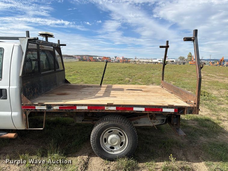 image for item FT6835 2012 Ford F350 Super Duty Crew Cab dump flatbed pickup truck