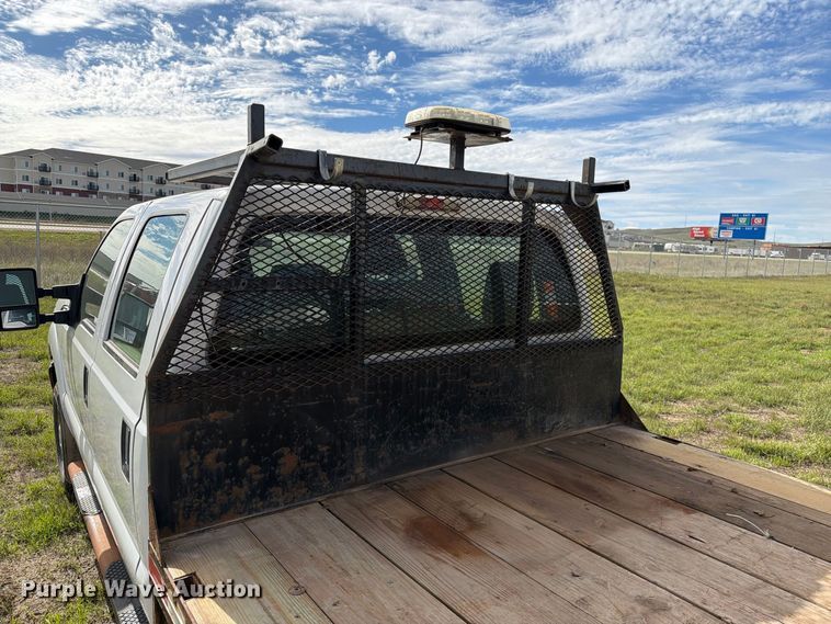 image for item FT6835 2012 Ford F350 Super Duty Crew Cab dump flatbed pickup truck