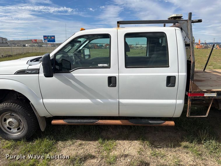 image for item FT6835 2012 Ford F350 Super Duty Crew Cab dump flatbed pickup truck