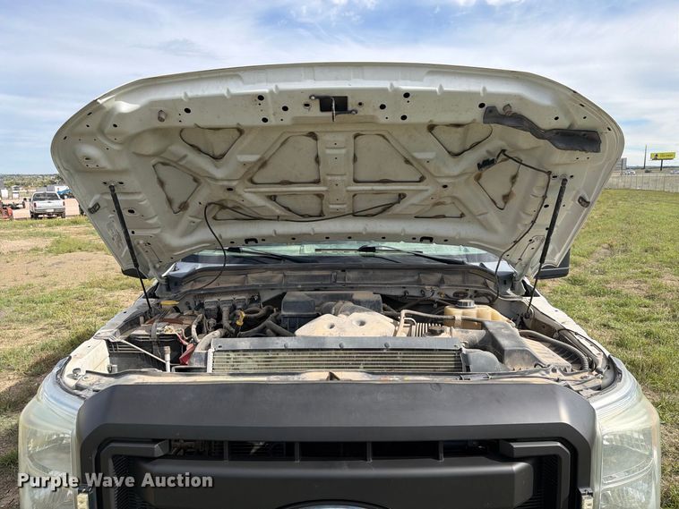 image for item FT6835 2012 Ford F350 Super Duty Crew Cab dump flatbed pickup truck