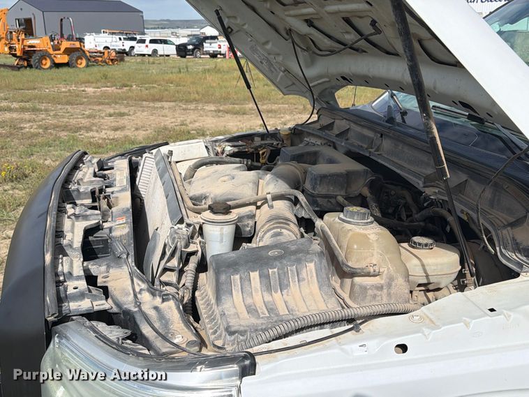 image for item FT6835 2012 Ford F350 Super Duty Crew Cab dump flatbed pickup truck